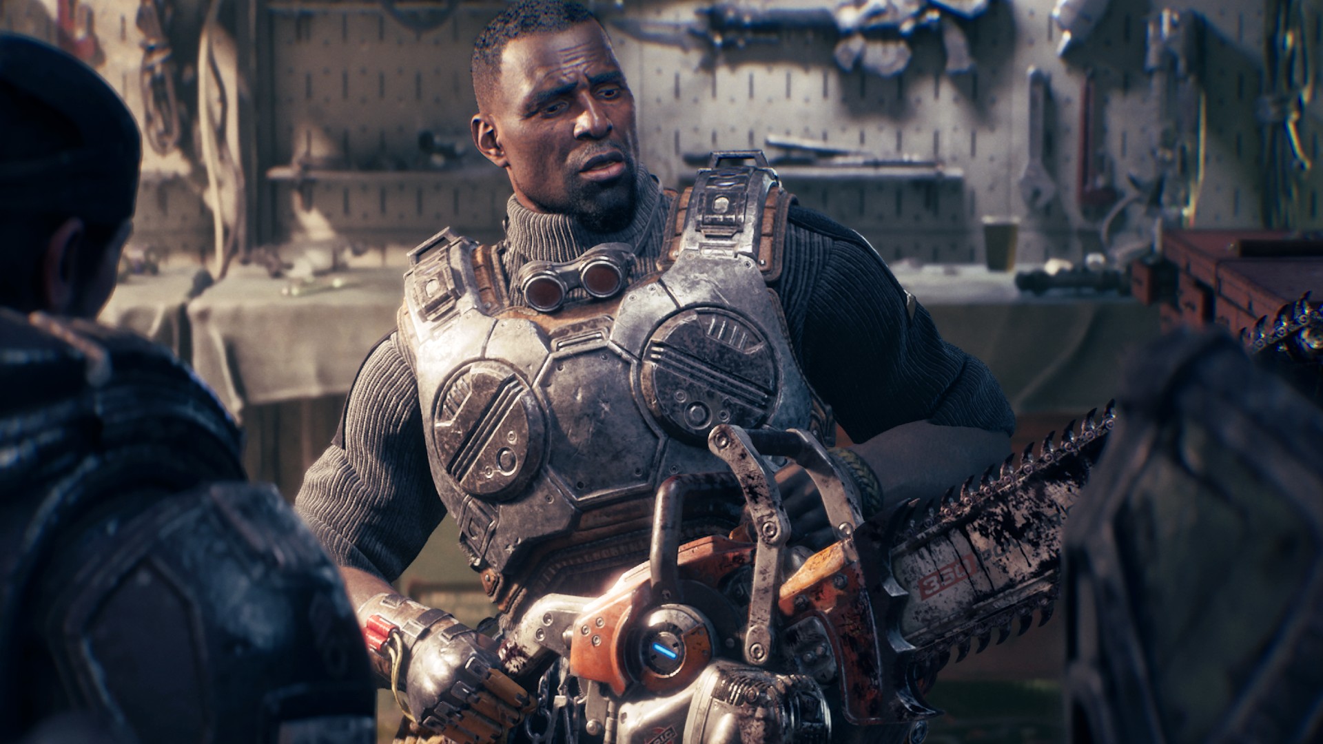 Russ holds a Protoype Lancer in the Gears of War E-Day campaign