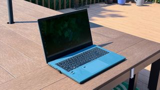 Acer Aspire Vero 15 (2023) outside on an outdoor table