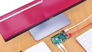 A Raspberry Pi 4 board installing a new OS