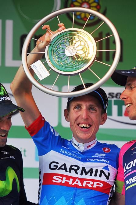 Dan Martin (Garmin-Sharp) all smiles on the podium