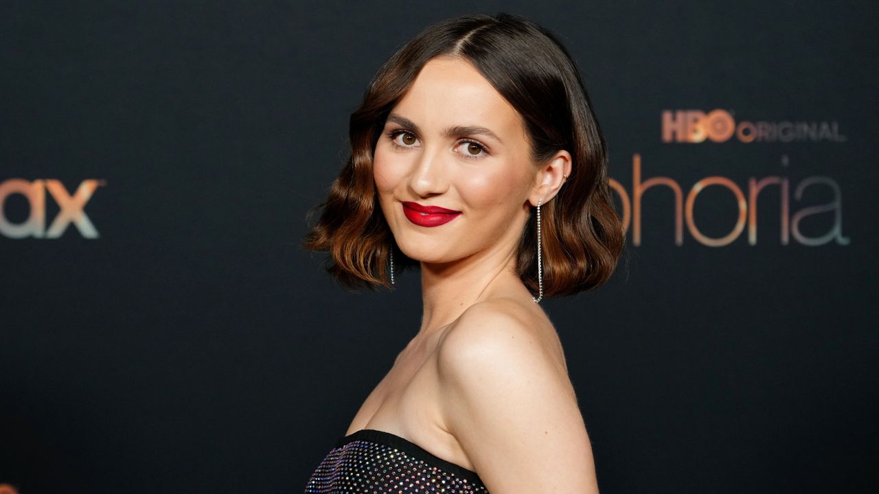 Maude Apatow&#039;s kitchen is swoonworthy. Here she is on the red carpet wearing a strapless dress and red lipstick against a black background