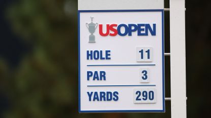 The 11th hole sign is seen during a practice round prior to the 123rd U.S. Open Championship at The Los Angeles Country Club
