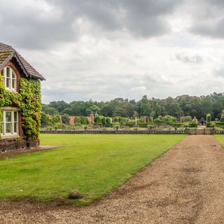 lawn and pathway at the queen's garden house in sandringham
