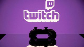 Learn how to stream on twitch - twitch logo with gaming controller