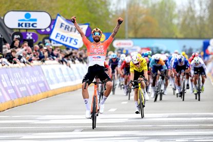 WAREGEM, BELGIUM - APRIL 01: Filippo Ganna of Italy and Team INEOS Grenadiers celebrates at finish line as race winner during the 80th Dwars Door Vlaanderen 2026 - Men's Elite a 184.6km one day race from Roeselare to Waregem / #UCIWT / on April 01, 2026 in Waregem, Belgium. (Photo by Dario Belingheri/Getty Images)
