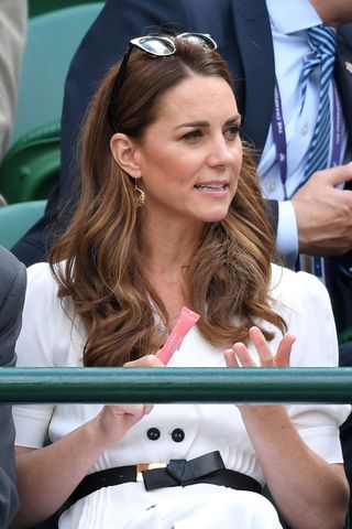 kate middleton holding a lip product - kate middleton beauty products