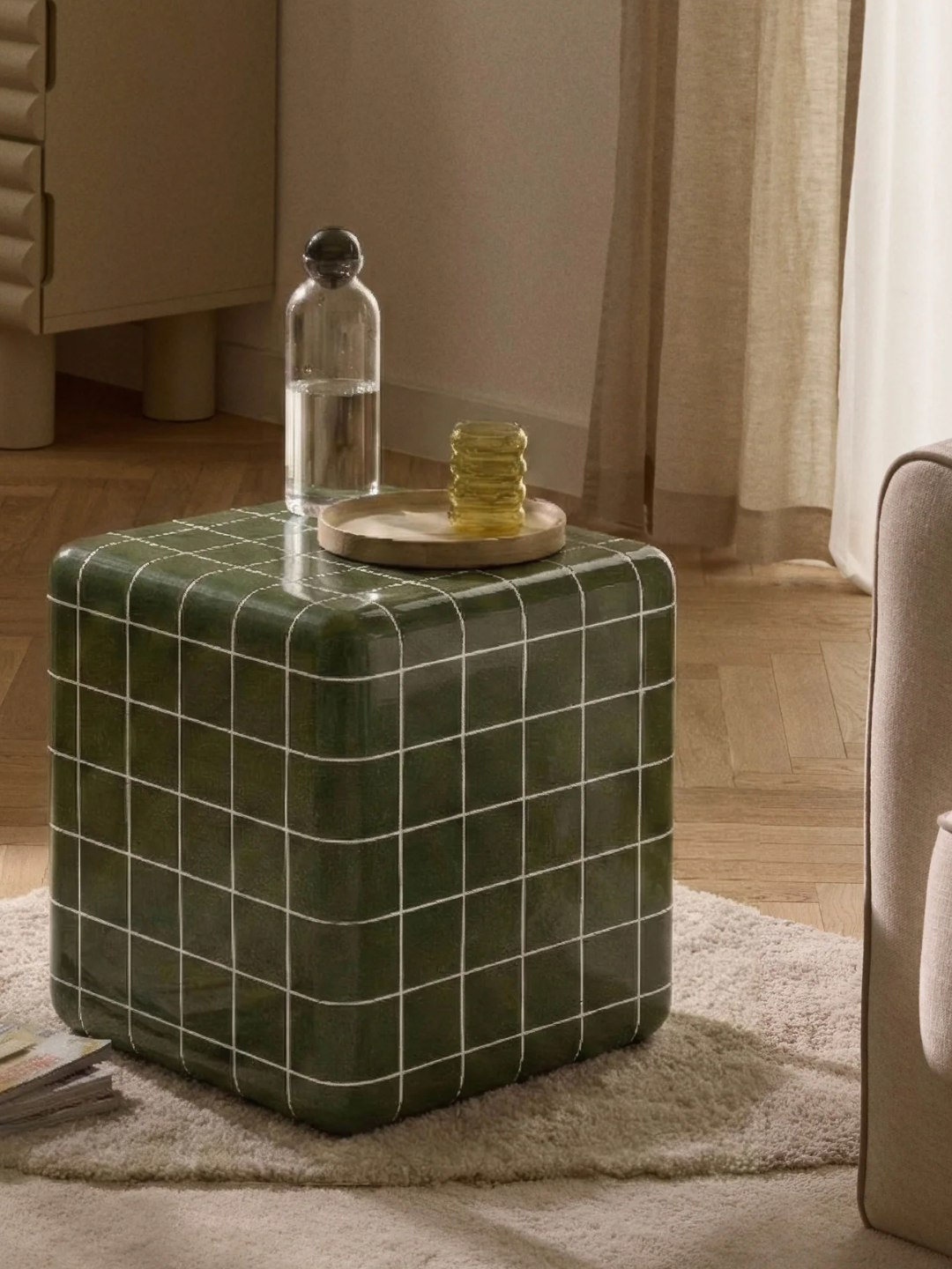 A green tiled side table from Westwing
