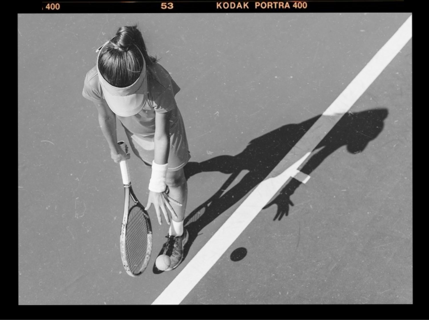 Young girls playing a variety of different sports: football, rollerblading, basketball, rock climbing and swimming