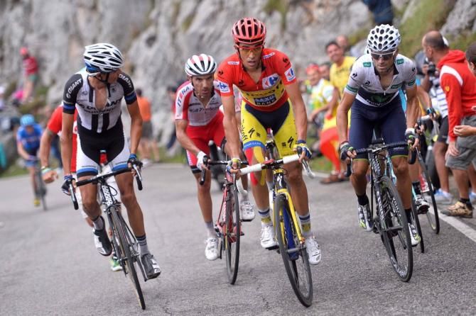 Warren Barguil (Giant-Shimano) checks out his company on the climb