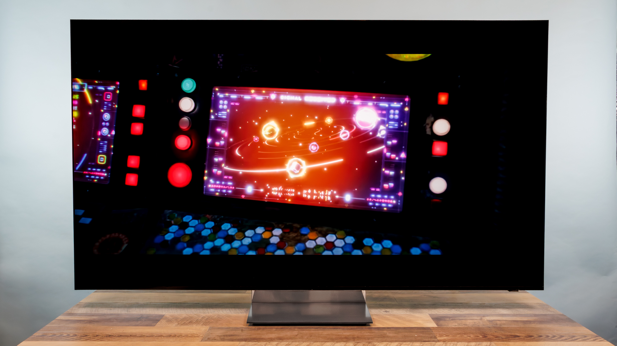 A Samsung R95H Micro RGB TV on a desk