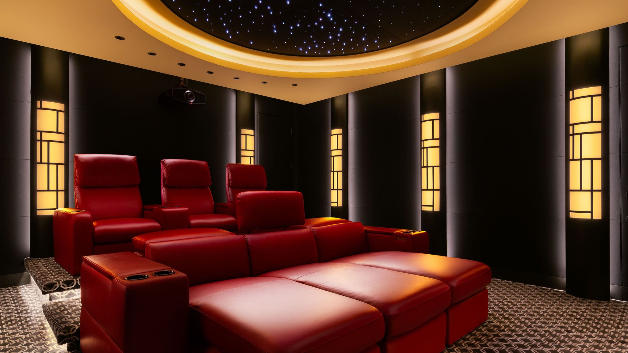 Home theater space with red seating 