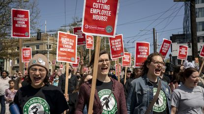 Starbucks workers march for better working conditions.