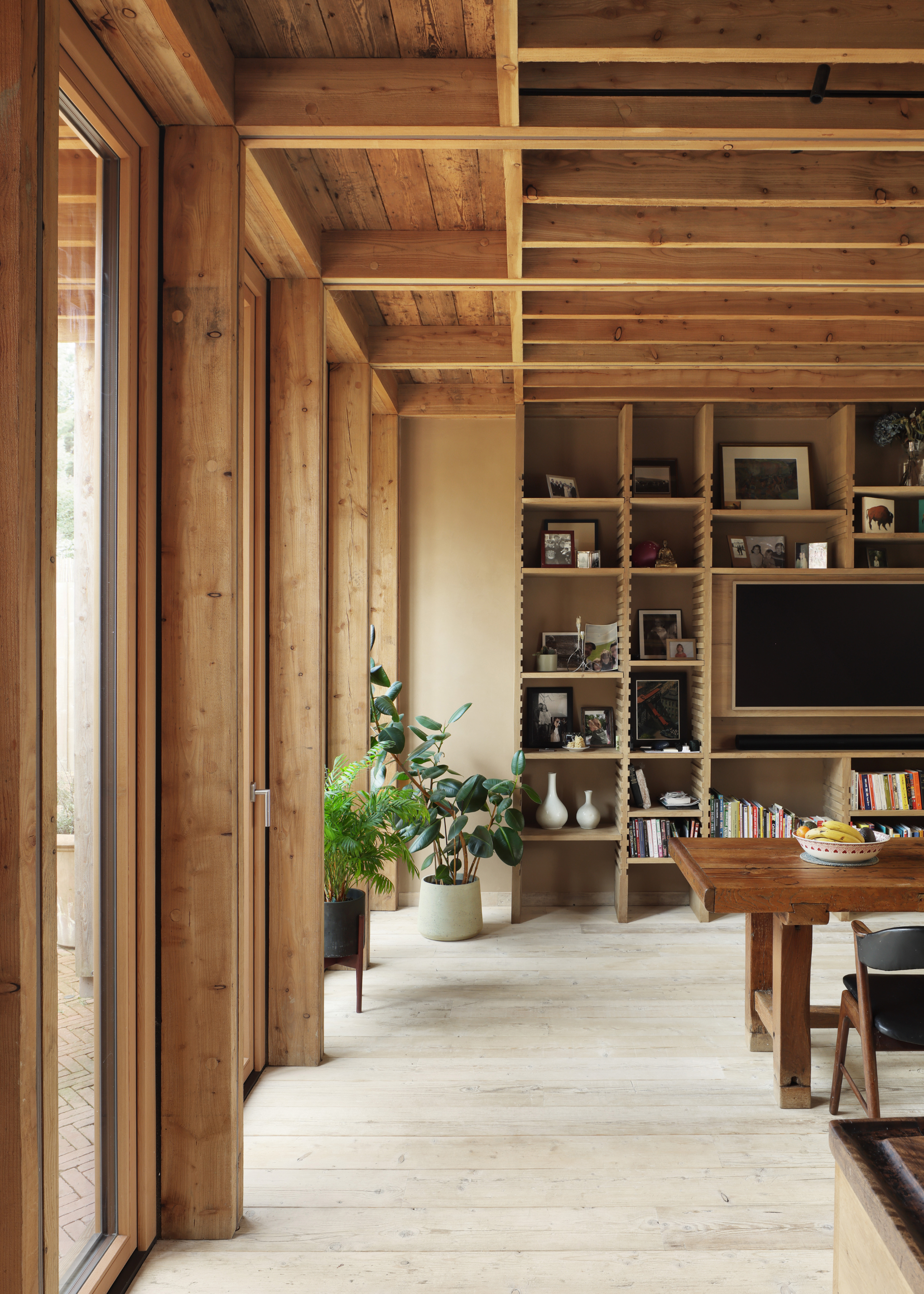 all wooden dining area with wooden clad ceilings and walls