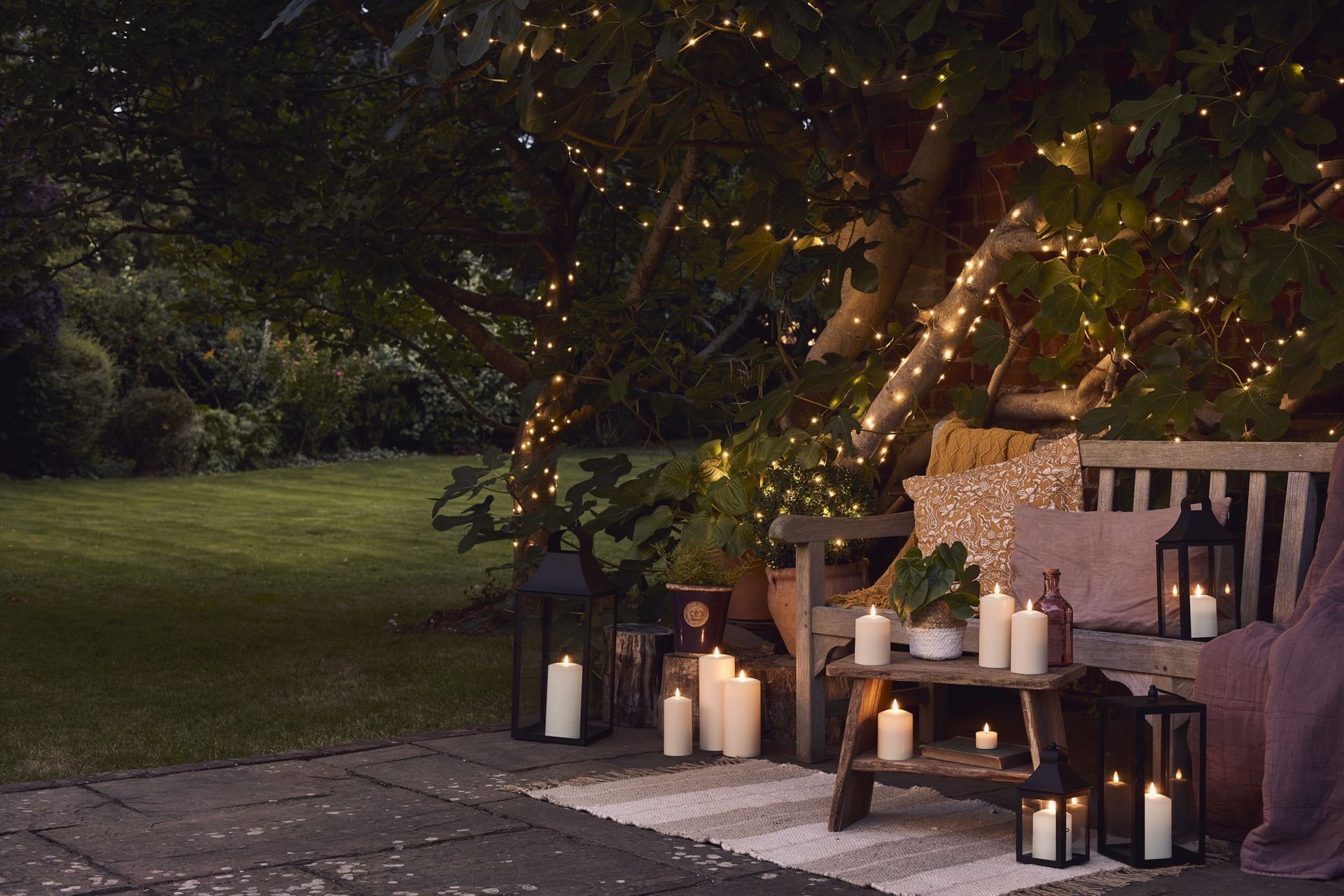 The best ways to hang string lights in your backyard