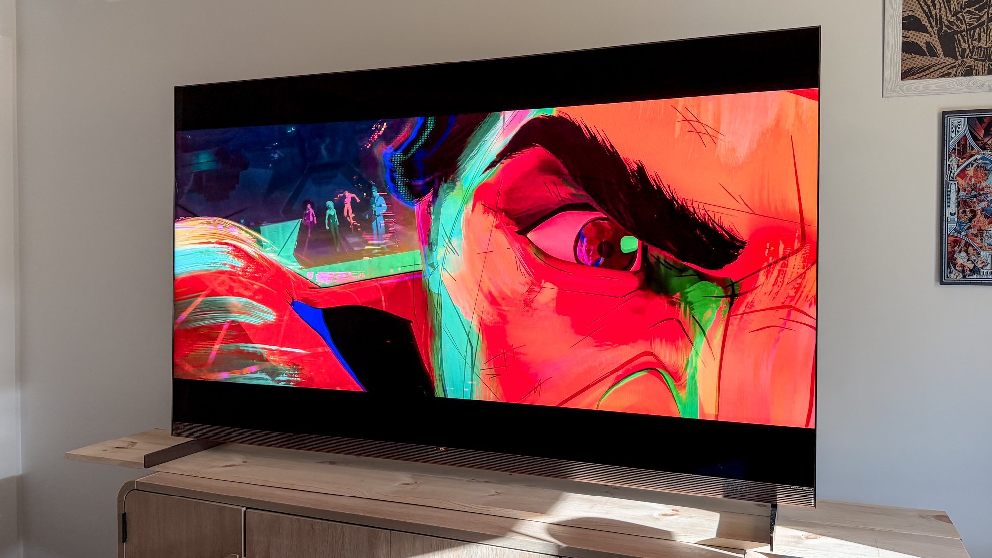 TCL X11L SQD Mini-LED TV on a side table