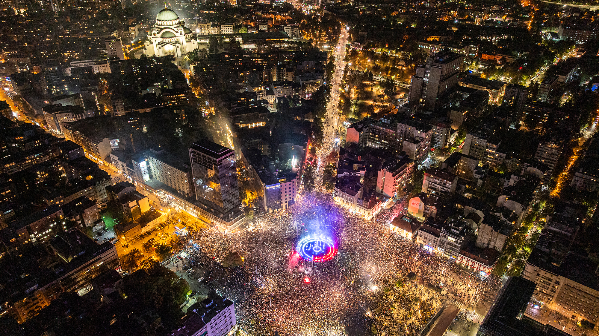 Supporters of the Student List movement gather at Slavija Square to celebrate after winning Serbia's snap parliamentary elections, in Belgrade, Serbia