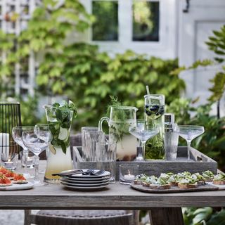 outdoor drinks with glasses and plates