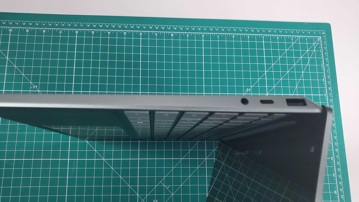 side view of a green laptop