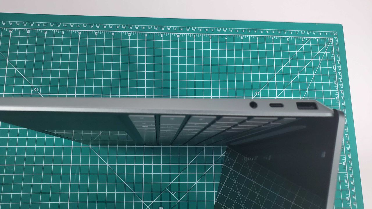 side view of a green laptop