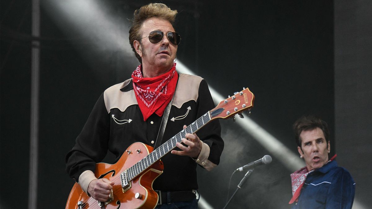Brian Setzer performing on stage
