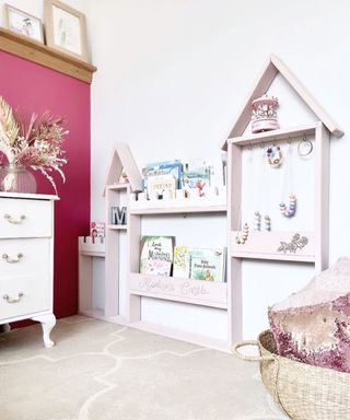 A girls room with DIY book shelf in castle shape