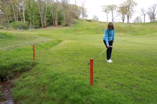 Two club-lengths lateral relief from red penalty area