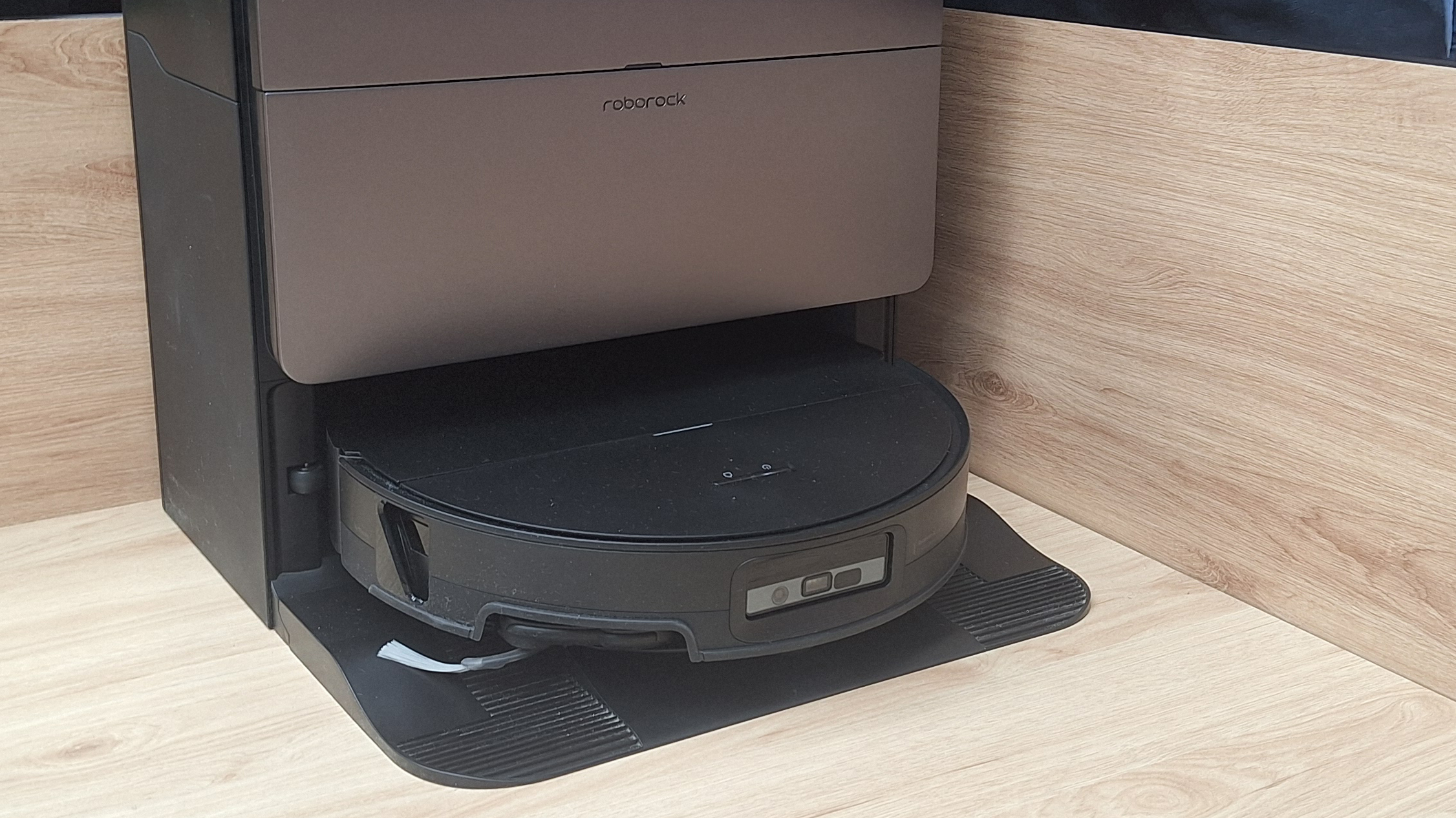 Roborock Saros 20 Sonic robot vacuum in its dock
