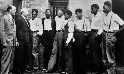 The Scottsboro boys and their lawyer in 1935.