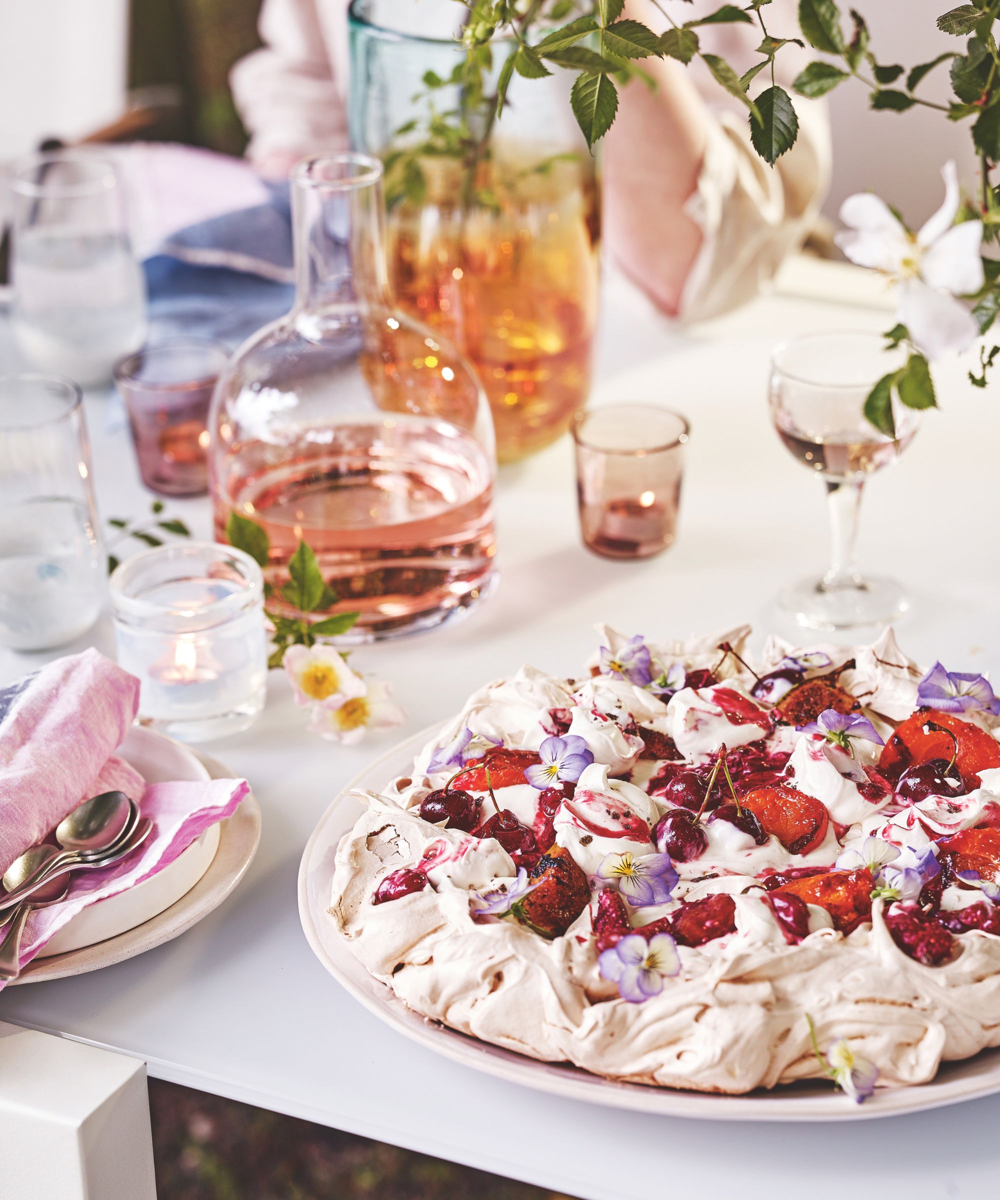 Meringue with cherry and apricot compote