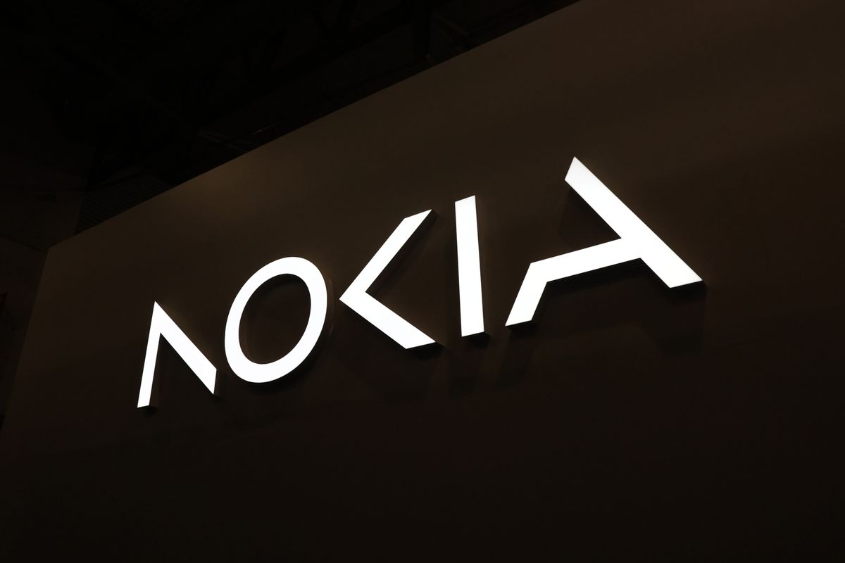 The redesigned Nokia Oyj logo on the company&#039;s stand on the opening day of the Mobile World Congress at the Fira de Barcelona venue in Barcelona, Spain,