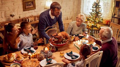 A family enjoys a holiday meal together.