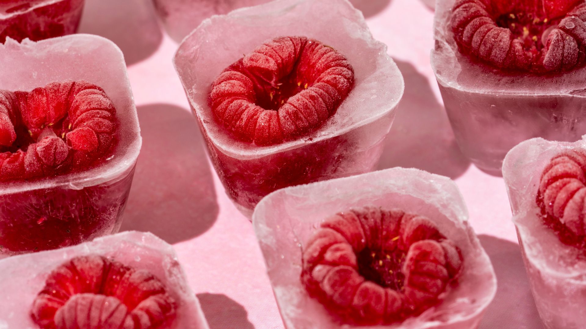 Raspberries in ice cube