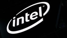 Intel logo illuminated in white against a black background at the Paris Games Week exhibition at the Porte de Versailles exhibition center in Paris.