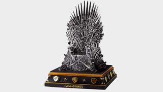 The Iron Throne bookend on a gray background