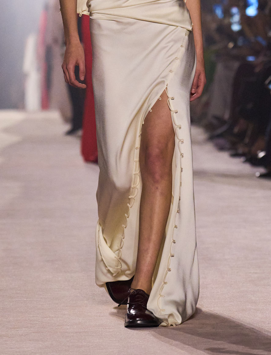Woman in dress and derby shoes