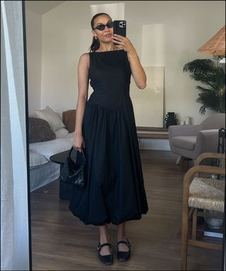 woman in mirror wearing summer outfits