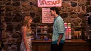 Taylor and Steven talking in front of the custard machine
