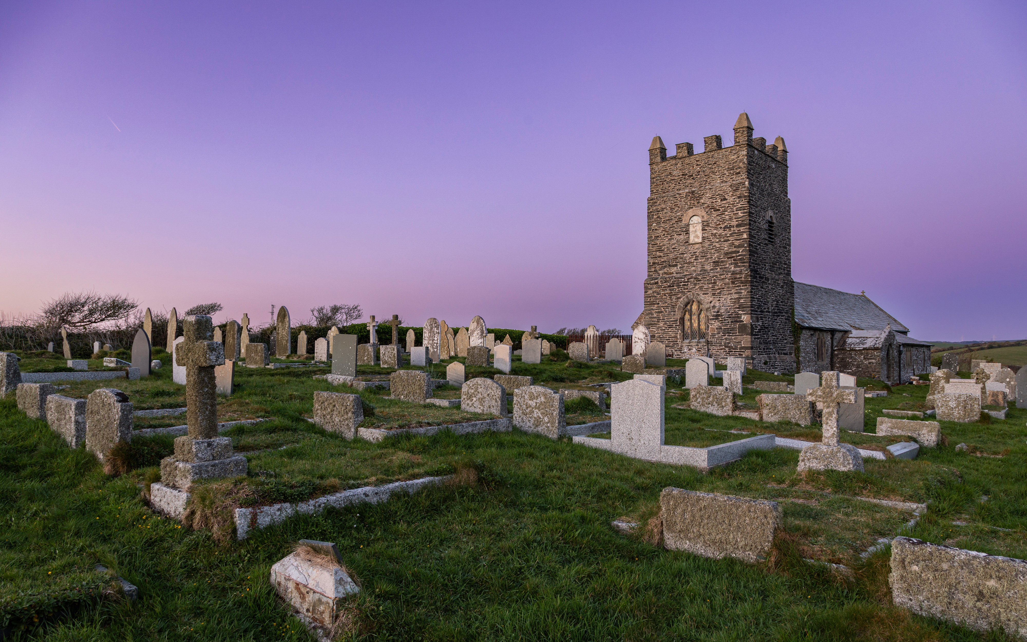 Church at sunset with purple sky