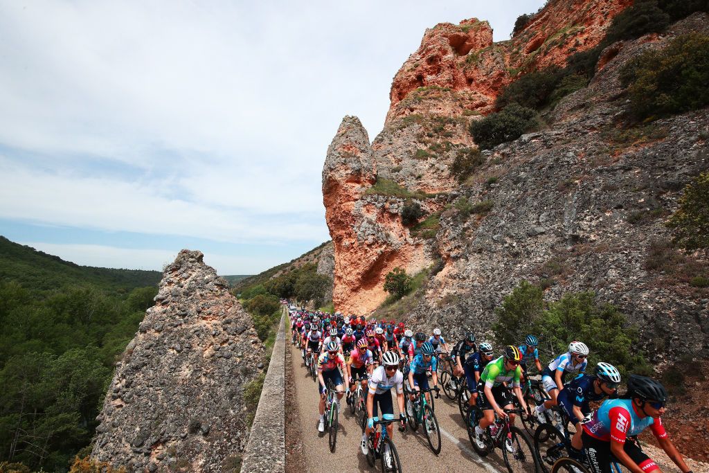 LAGUNAS DE NEILA SPAIN MAY 22 Audrey CordonRagot of France and Team Trek Segafredo Lotte Kopecky of Belgium and Team SD Worx Green Points Jersey Sara Martin Martin of Spain and Movistar Team and a general view of the peloton competing during the 7th Vuelta a Burgos Feminas 2022 Stage 4 a 1251km stage from Covarrubias to Lagunas de Neila 1867m VueltaBurgos BurgosFem UCIWWT on May 22 2022 in Lagunas de Neila Spain Photo by Gonzalo Arroyo MorenoGetty Images