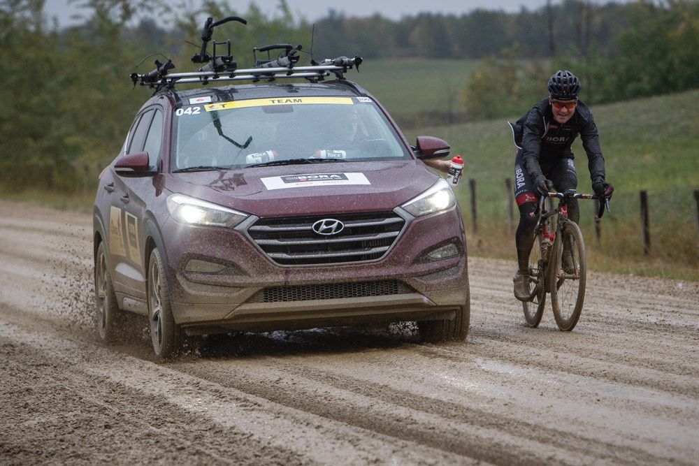 Riders and cars had to contend with todays wet and muddy roads