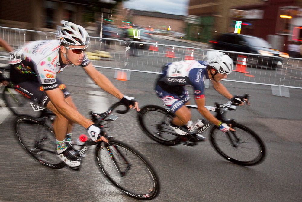 A Jelly Belly and a Canyon Shimano rider duel through a corner during stage 2 at the North Star Grand Prix