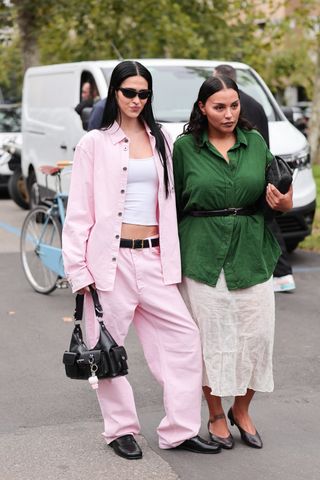 Amelia Gray Hamlin and Paloma Elsesser attend the Boss show