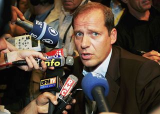 STRASBOURG FRANCE JUNE 30 Tour de France Director Christian Prudhomme is questioned by media after a number of riders were suspended by their teams or the organisers following a drug taking investigation by Spanish police during preparations for the Tour de France on June 30 2006 in Strasbourg France Photo by Bryn LennonGetty Images