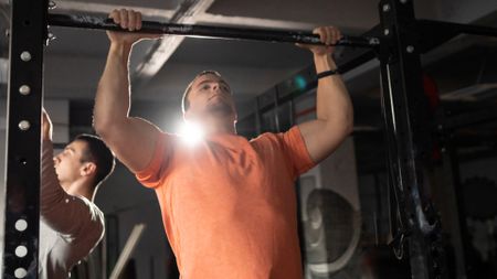 A man performing pull ups