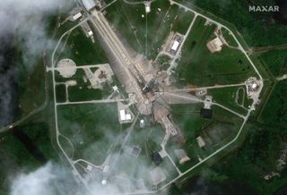 A satellite image captured Aug. 27, 2021 shows a SpaceX Falcon 9 rocket and Dragon cargo ship on Launch Complex 39A at NASA's Kennedy Space Center in Florida, ahead of the company's 23rd cargo resupply mission to the International Space Station.