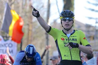 Team Visma-Lease a Bike's Dutch cyclist Olav Kooij celebrates crossing the finish line to win the 5th stage of the Paris-Nice cycling race, 193,5 km between Saint-Sauveur-de-Montagut and Sisteron, on March 7, 2024. (Photo by Thomas SAMSON / AFP)