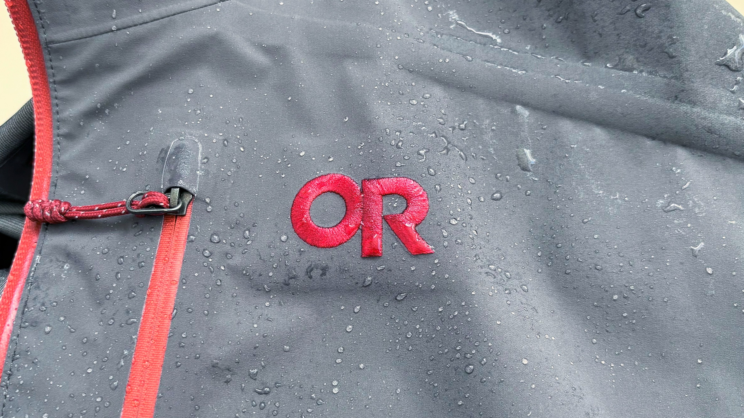 Close-up of the Outdoor Research Foray 3L rain jacket in "Storm"