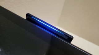 WD_BLACK P40 Game Drive SSD for Xbox and PC, shown on top of PC with RGB light strip.