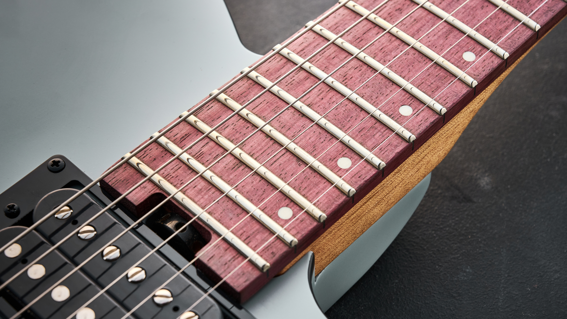 Close up of the amaranth fretboard on the Charvel Standard Series San Dimas Style 2 SD2 HH HT electric guitar