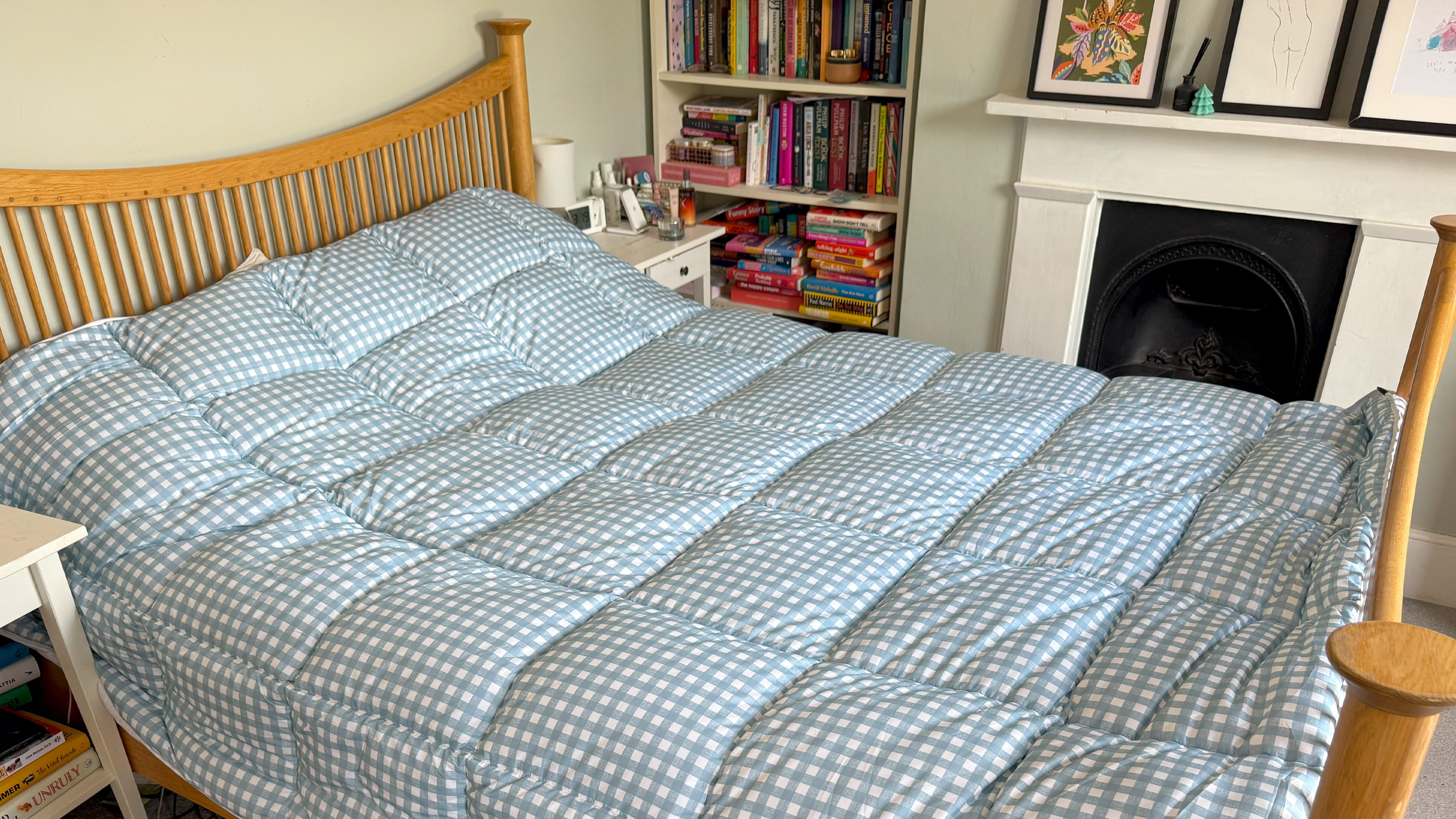 The blue gingham Night Lark Coverless Duvet being tested at home
